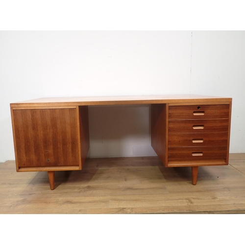 78 - A Gordon Russell Ltd, Broadway, Worcester Large Desk fitted drawers to one side and a cover to the o... 