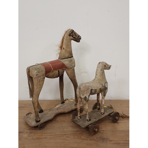 88 - Two pull-along models of horses, 21 & 14in H