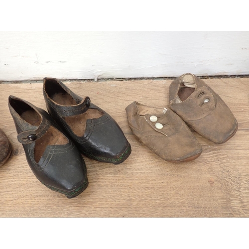 98 - Four pairs of leather children's Shoes