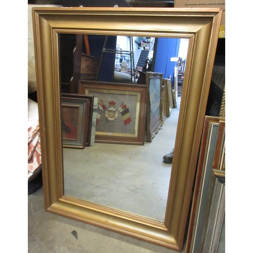 35 - A gilt Pier Glass with moulded detail above the arched plate, 4ft 5in H x 2ft 1in W and a gilt Wall ... 