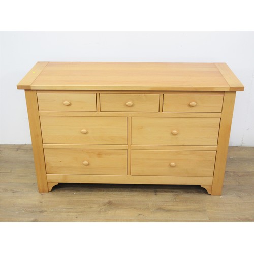 27 - A modern beechwood Chest of seven drawers 4ft 5in W x 2ft 8in H