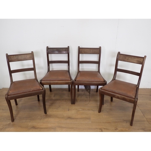 84 - A set of four 19th Century Dining Chairs with sabre front supports and drop in seats