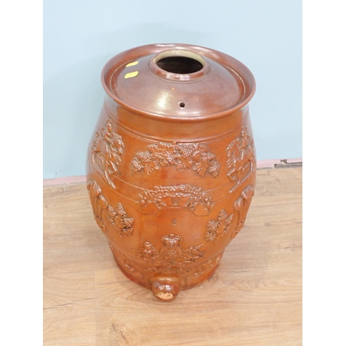 100 - An antique salt glazed Rum Toft or Cask with relief moulded decoration 1ft 6in H