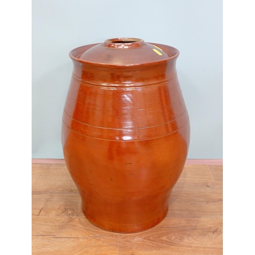 100 - An antique salt glazed Rum Toft or Cask with relief moulded decoration 1ft 6in H