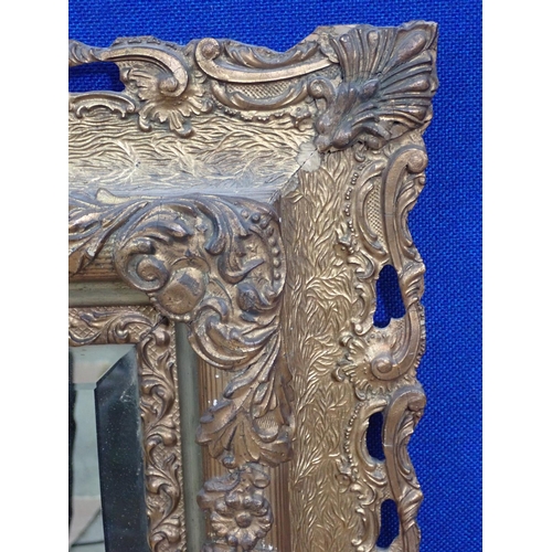 12 - A gilt framed Wall Mirror with bevelled glass 2ft 10in H x 2ft 3in W