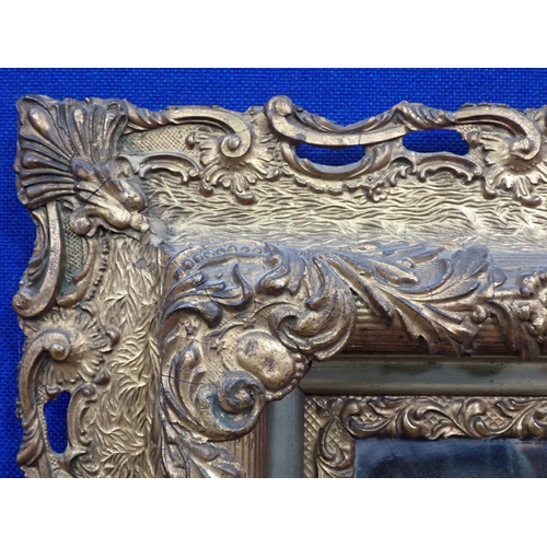 12 - A gilt framed Wall Mirror with bevelled glass 2ft 10in H x 2ft 3in W