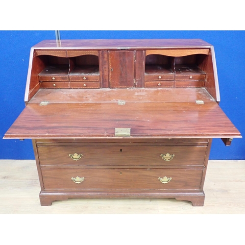 126 - A Georgian mahogany Bureau fitted two short and three long drawers mounted upon shallow bracket feet... 