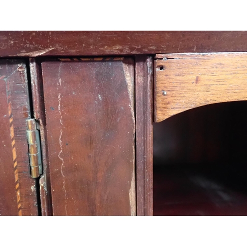 126 - A Georgian mahogany Bureau fitted two short and three long drawers mounted upon shallow bracket feet... 