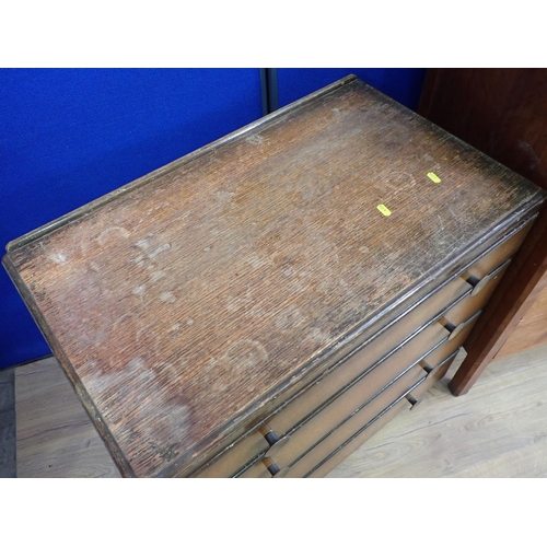 129 - A mid-century oak two door Cupboard fitted two drawers 3ft H x 2ft 9in W and an oak veneered Chest o... 