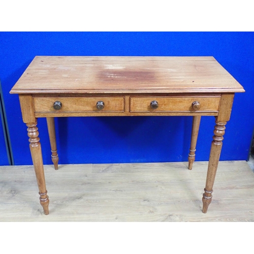 136 - A Victorian mahogany two drawer Side Table mounted upon turned supports 3ft 4in W x 2ft 6in H