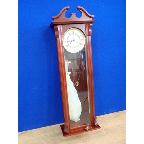 146 - A mahogany cased Wall Clock 3ft 10in H