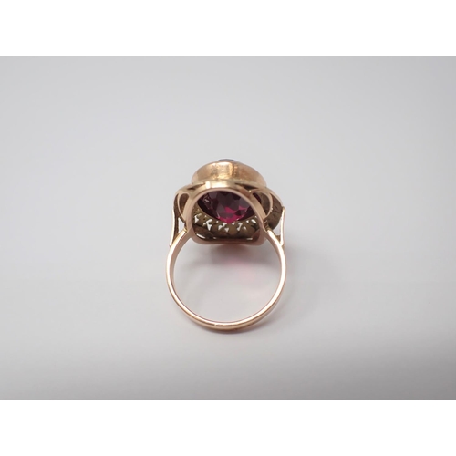 164 - A Dress Ring rubover-set large oval-cut synthetic ruby in 18ct gold ring size P 1/2