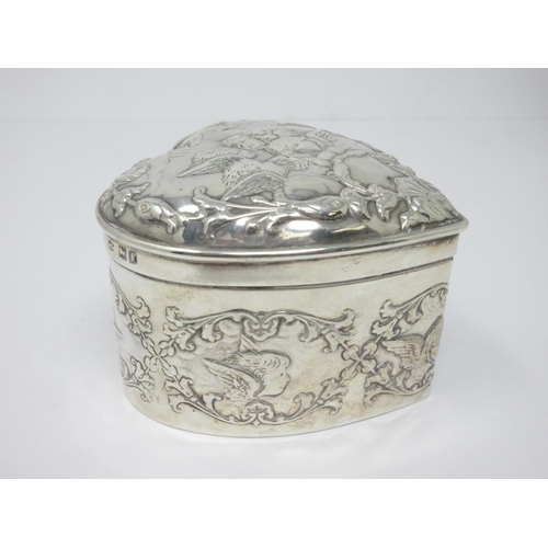 210 - An Edward VII silver heart shape Box with hinged cover embossed cherubs, etc, London 1901, maker: Wm... 