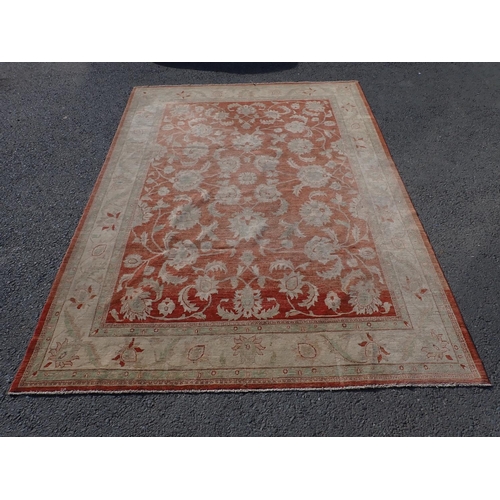 24 - A large Ziegler style cream and red woollen Carpet 374cm x 271cm