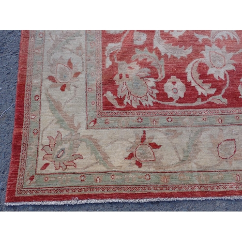 24 - A large Ziegler style cream and red woollen Carpet 374cm x 271cm