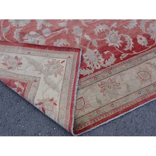 24 - A large Ziegler style cream and red woollen Carpet 374cm x 271cm