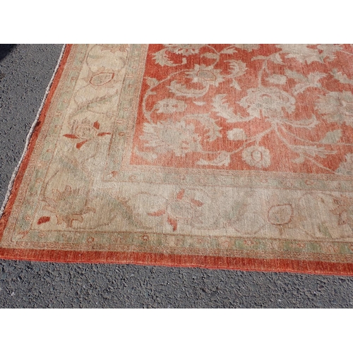 24 - A large Ziegler style cream and red woollen Carpet 374cm x 271cm