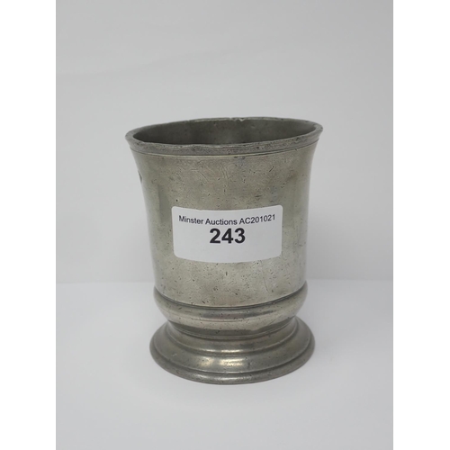 243 - An old pewter 1/2 pint Mug