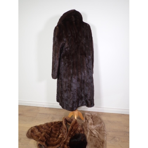 249 - A dark brown Mink Coat, approx UK size 14 and a Hat, a mid brown Mink Jacket A/F and fur Stole