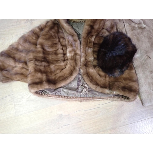 249 - A dark brown Mink Coat, approx UK size 14 and a Hat, a mid brown Mink Jacket A/F and fur Stole