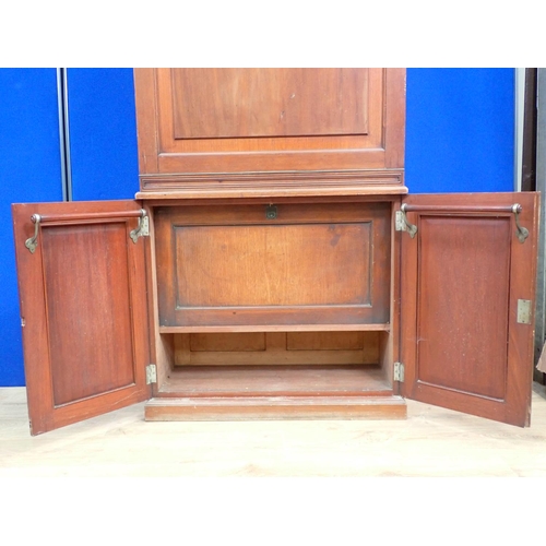 30 - An Edwardian walnut ship's Dressing Cabinet the upper section fitted pair of cupboard doors enclosin... 