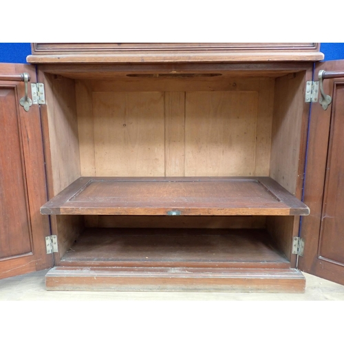 30 - An Edwardian walnut ship's Dressing Cabinet the upper section fitted pair of cupboard doors enclosin... 