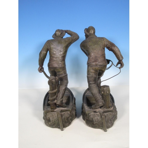 302 - A pair of metal Figures of fishermen 11in H