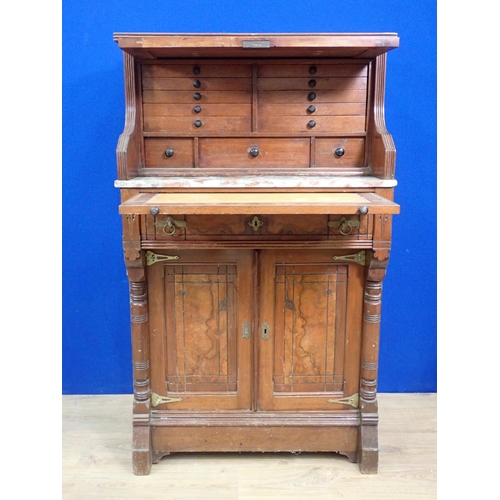 319 - A Victorian aesthetic movement walnut Cabinet with hinged front enclosing drawers above marble toppe... 