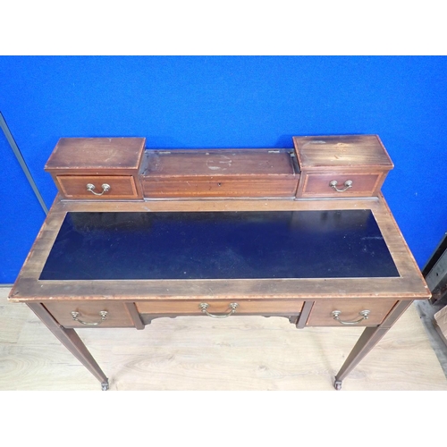 339 - An Edwardian mahogany Desk with raised back fitted two drawers mounted upon square cut tapering supp... 