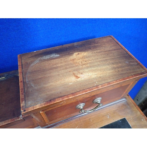 339 - An Edwardian mahogany Desk with raised back fitted two drawers mounted upon square cut tapering supp... 