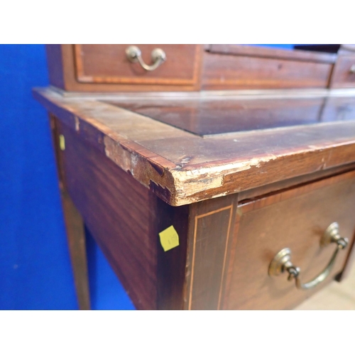 339 - An Edwardian mahogany Desk with raised back fitted two drawers mounted upon square cut tapering supp... 