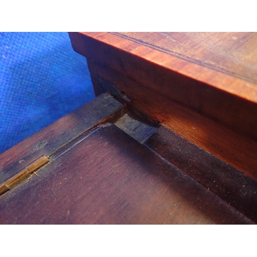 339 - An Edwardian mahogany Desk with raised back fitted two drawers mounted upon square cut tapering supp... 