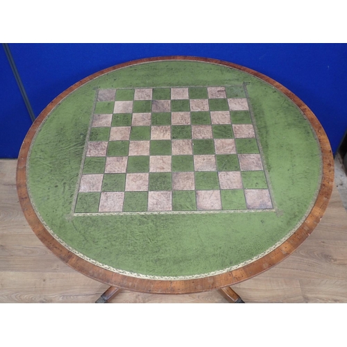 345 - A Georgian style mahogany circular Games Table with green tooled leather top on quadruple base 3ft D... 