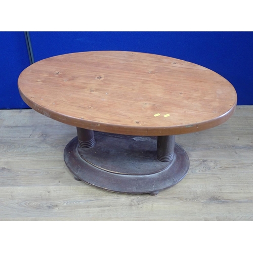 358 - A pine oval Coffee Table on stained base 3ft 3in W x 1ft 7in H