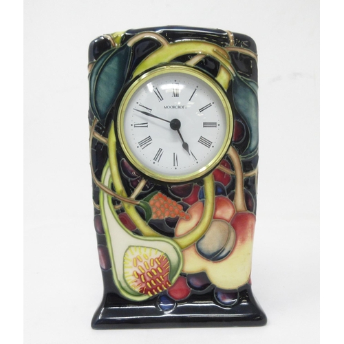 382 - A modern Moorcroft pottery cased Mantel Clock with tube lined fruit design, 6in, 2000