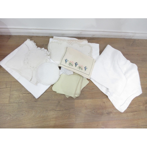 387 - A collection of White Table Linen including Table Cloths, Place Mats, Napkins, Runners, etc