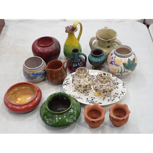 406 - A collection of Pottery including Arts and Crafts Royal Doulton cylindrical Vase, a green glazed Bow... 