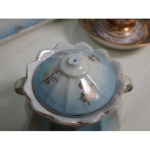 422 - A Continental gilt and painted Cabinet Cup and Saucer and a Coffee Set