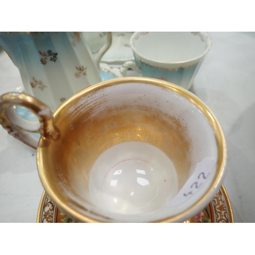 422 - A Continental gilt and painted Cabinet Cup and Saucer and a Coffee Set