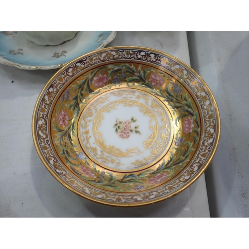 422 - A Continental gilt and painted Cabinet Cup and Saucer and a Coffee Set