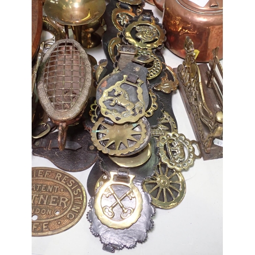 428 - A collection of brass and copper ware including Coaching Horn, , Letter Rack, Horse Brasses, etc.