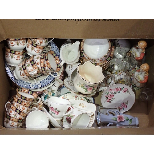 446 - Box of ceramics including Tea Service, Figurines, pair of blue glass Vases A/F, chicken  Egg Basket,... 