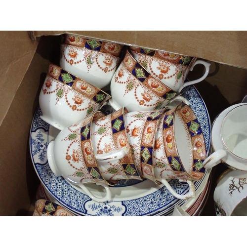 446 - Box of ceramics including Tea Service, Figurines, pair of blue glass Vases A/F, chicken  Egg Basket,... 