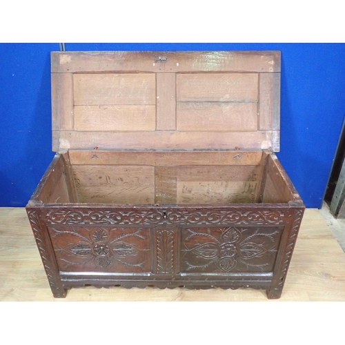 491 - A 17th Century West Country oak two panel Coffer with carved foliate decoration 4ft W x 2ft H