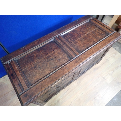 491 - A 17th Century West Country oak two panel Coffer with carved foliate decoration 4ft W x 2ft H