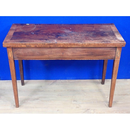 509 - A 19th Century mahogany and rosewood crossbanded fold over Card Table with shell inlay mounted upon ... 