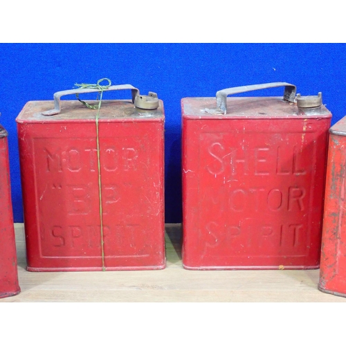 533 - Three Shell Petrol Cans and one B.P. Petrol Can