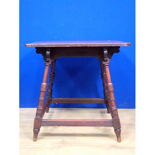 540 - An Arts and Crafts mahogany Occasional Table on ring turned supports united by surrounding stretcher... 