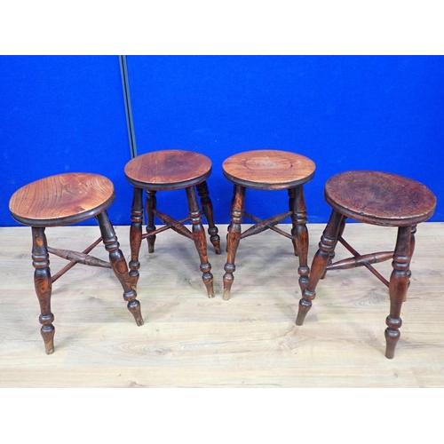 556 - Four antique elm Stools each on four turned supports united by X-stretcher 1ft 7in H x 1ft D