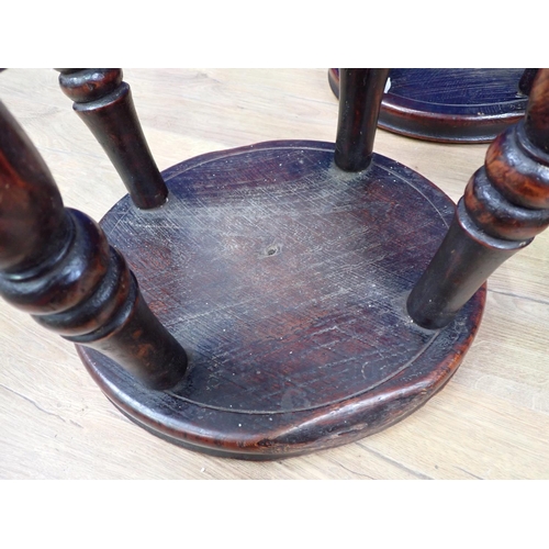 556 - Four antique elm Stools each on four turned supports united by X-stretcher 1ft 7in H x 1ft D